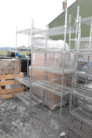 Two chrome finish wire shelving units in good condition, multiple tiers, sturdy design, must be dismantled by buyer.