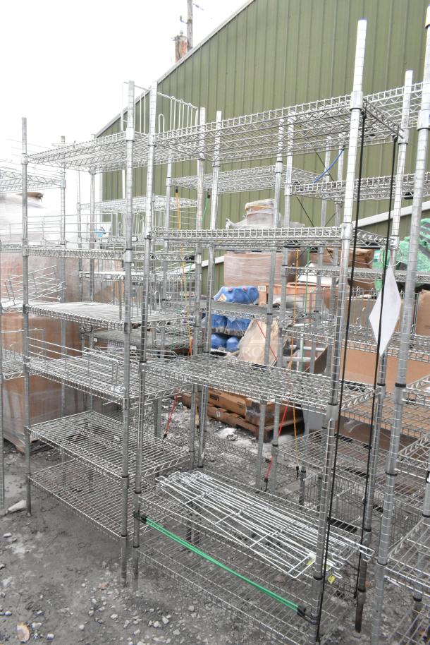 Two chrome finish wire shelving units in used condition, ready for dismantling. Buyer to arrange freight and dismantle.