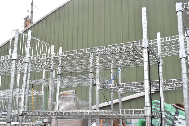 Two chrome finish wire shelving units, sturdy construction, good condition. Buyer must dismantle. Consider freight costs.