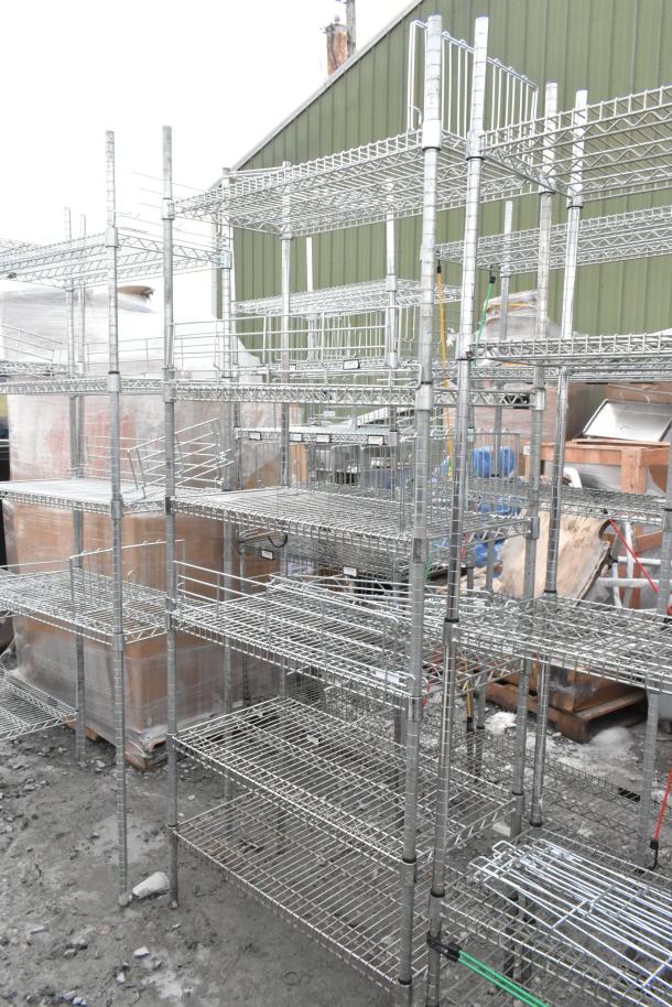 Two chrome finish wire shelving units in used condition, featuring multiple shelves and sturdy construction. Buyer disassembly required.