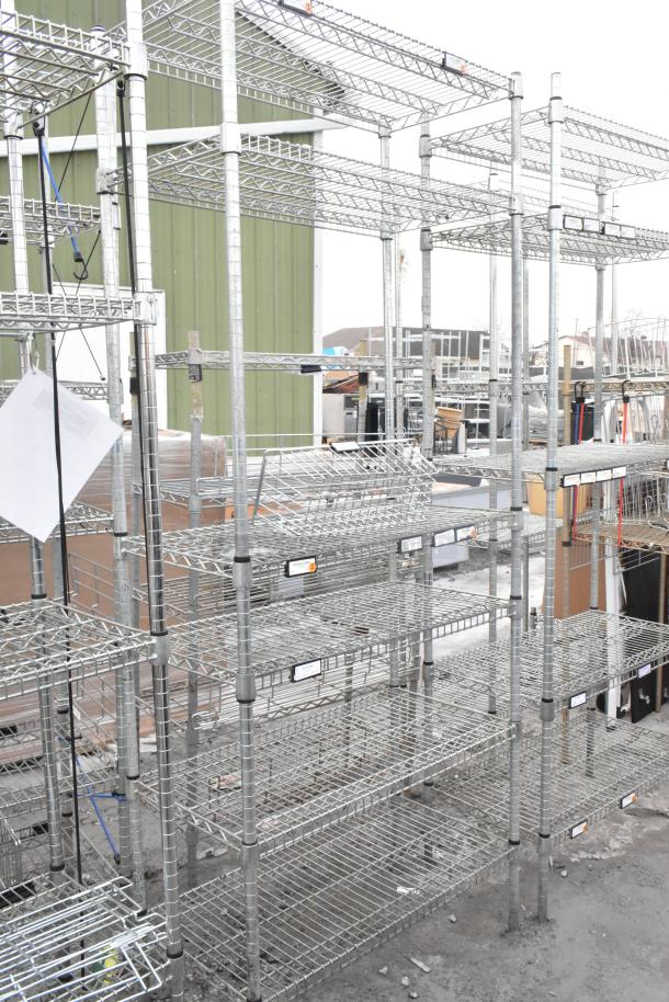 Two chrome finish wire shelving units, adjustable shelves, sturdy construction. Buyer must dismantle. Consider freight charges.