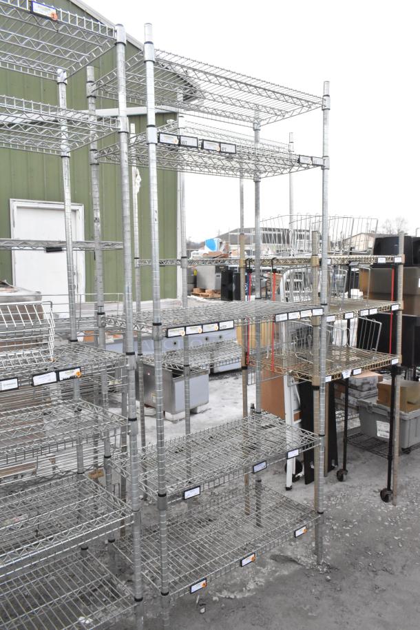 Two chrome finish wire shelving units, freestanding. Good condition. Tags indicate organization. Buyer must dismantle.