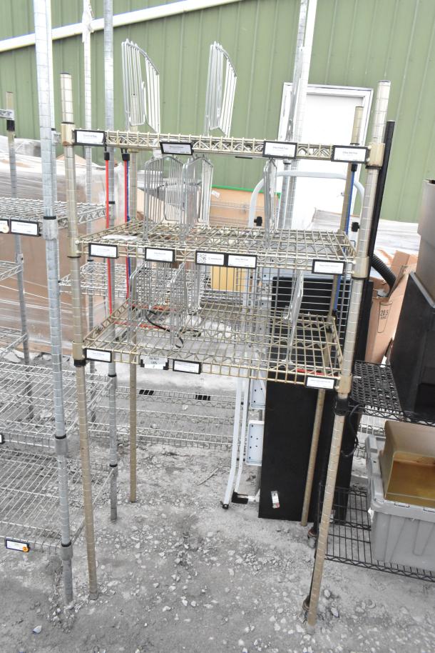 3-tier wire shelving unit, sturdy metal construction. Visible wear. Buyer dismantle required. Consider freight charges.