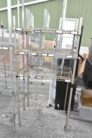 3-tier wire shelving unit, sturdy metal construction. Visible wear. Buyer dismantle required. Consider freight charges.