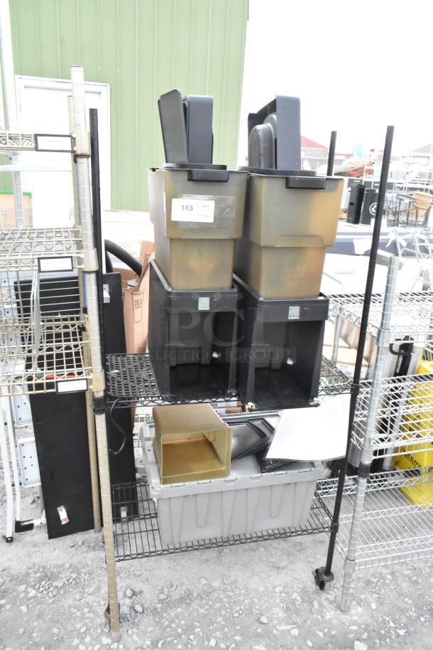 Black and tan 2-tier wire shelving unit with beverage dispensers. Buyer dismantles. Consider freight costs. Labels indicate QTY 183.