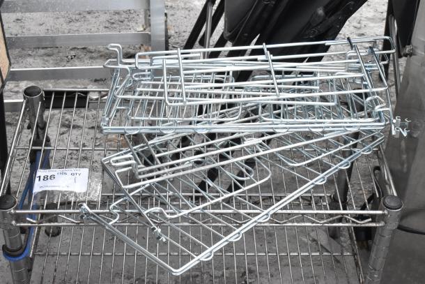 Chrome finish 2 tier wire shelving unit with contents. Includes dismantling instructions for buyer. Consider freight charges.