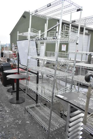 Chrome finish 6-tier wire shelving unit, sturdy condition. Buyer to dismantle for shipping; freight charges apply.