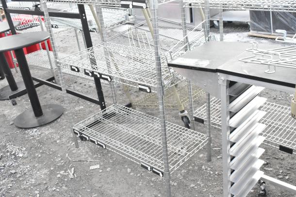 Chrome finish 6-tier wire shelving unit, sturdy construction, shows minor wear. Buyer must dismantle; consider freight charges.