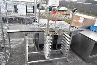 2-tier shelving unit and metal commercial double pan transport rack on commercial casters. Ideal for storage and transport.