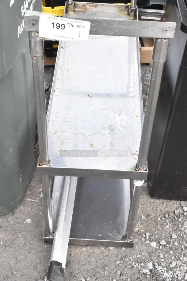 Metal 2 Tier Over Shelf, durable construction with some surface wear, visible auction tag indicating item and quantity.