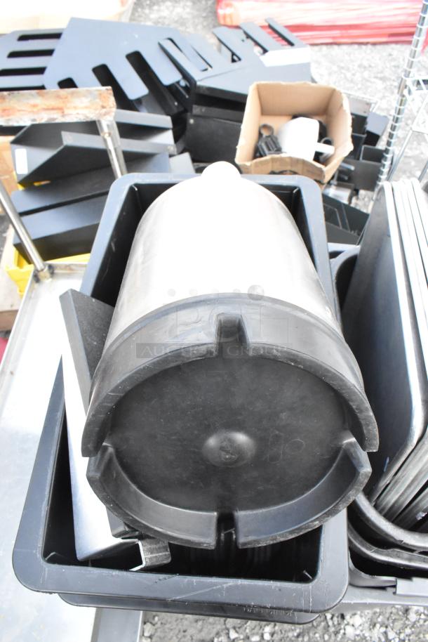 Lot of various items including poly Slim Jim trash cans and metal pans in mixed condition.