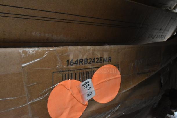 Cardboard box with the marking "164RB242EMR." The box shows signs of wear, evident by scratches and dents.