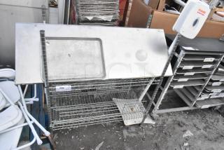 Chrome finish 2 tier wire shelving unit with top shelf. Good condition. Buyer must dismantle. Consider freight charges.