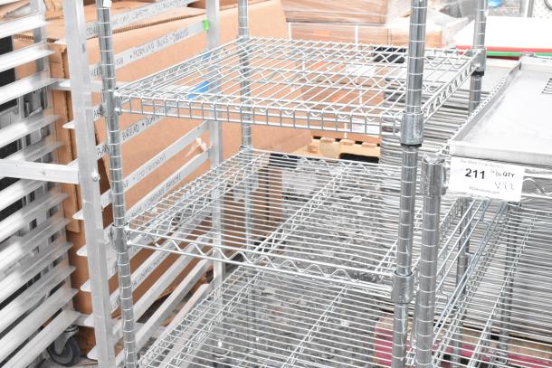 Chrome finish 6-tier wire shelving unit in good condition. Not dismantled. Consider freight charges.