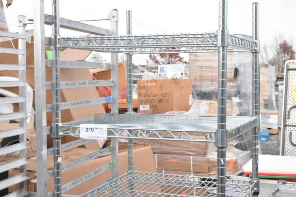 Chrome finish 6-tier wire shelving unit, sturdy construction, used condition. Note: buyer must dismantle for shipping.