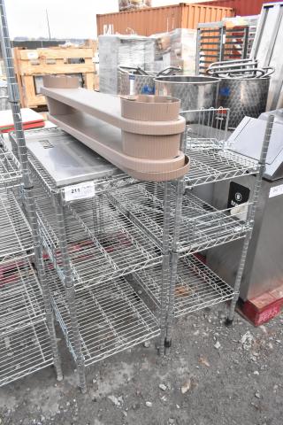 Two chrome finish wire shelving units in good condition, featuring multiple adjustable shelves. Buyer must dismantle.