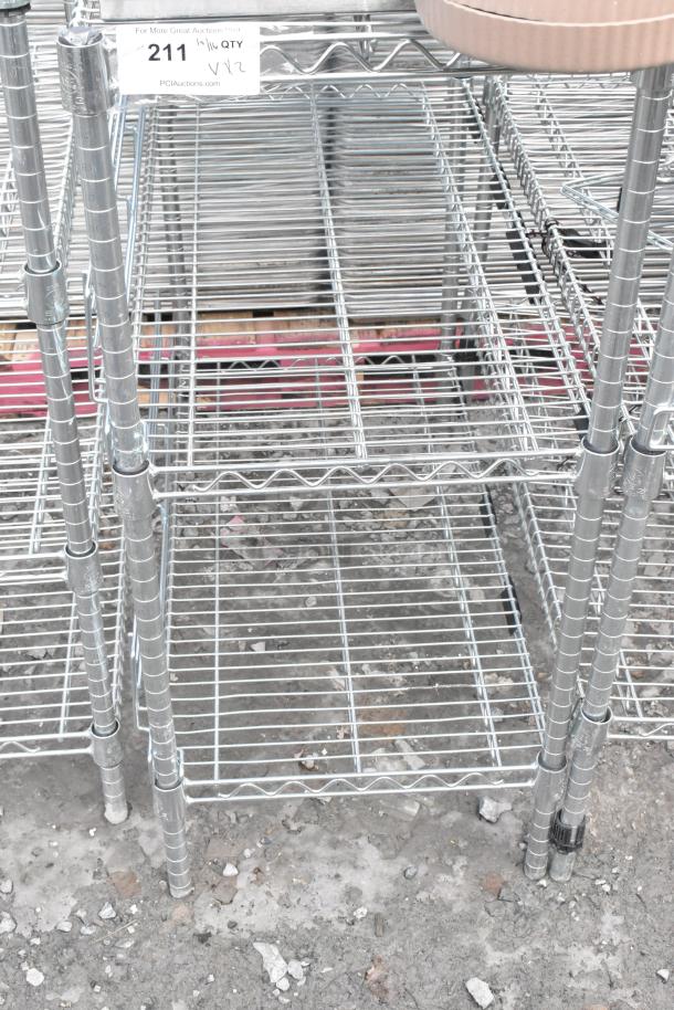 Two chrome finish wire shelving units, sturdy design, ideal for storage. Buyer required to dismantle. Consider freight costs.