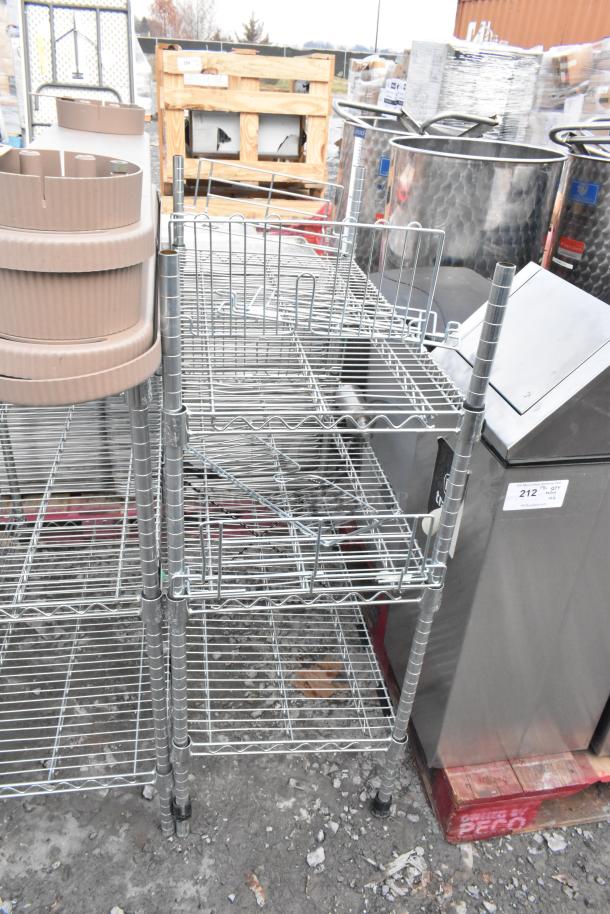 Two chrome finish wire shelving units with adjustable shelves, shown in good condition. Buyer must dismantle.