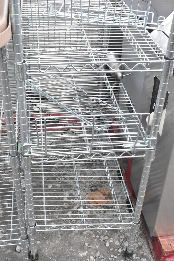 Two chrome finish wire shelving units in good condition, multiple tiers, robust design, ideal for storage. Buyer dismantles.