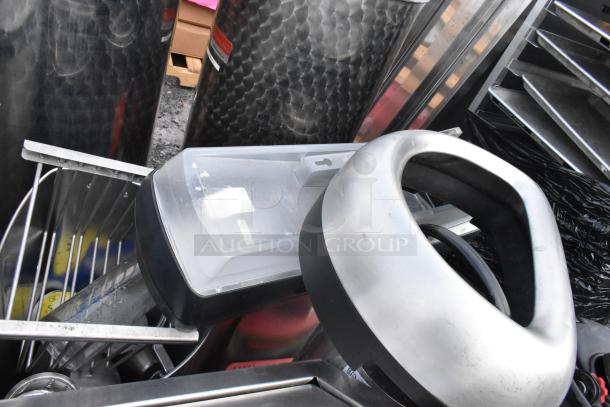 Pallet lot featuring trash can shells, cutting boards, and a hot beverage dispenser. Various items, mixed condition.