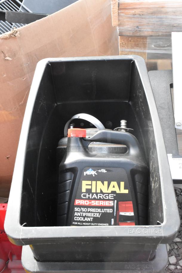 Black Slim Jim trash can containing Peak Final Charge Pro Series antifreeze.