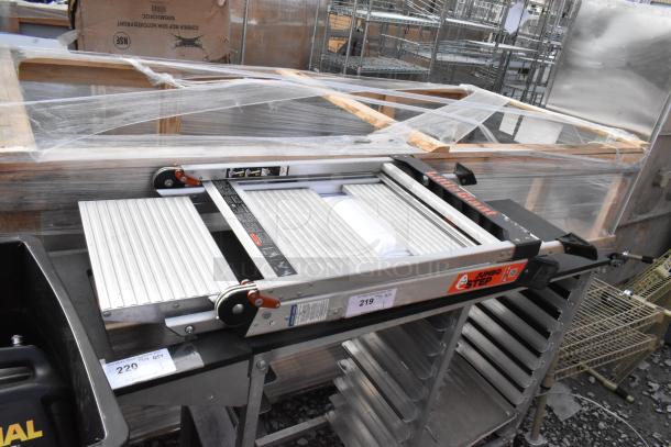 Little Giant Jumbo Step Ramp in good condition, features aluminum construction, adjustable height, security labels, and safety markings.