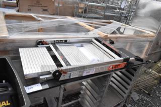 Little Giant Jumbo Step Ramp in good condition, features aluminum construction, adjustable height, security labels, and safety markings.