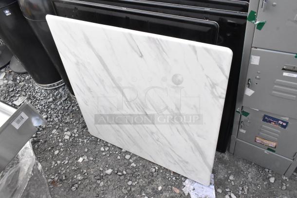 Set of five tabletops, various sizes, white marble design, excellent condition, suitable for diverse decor styles.