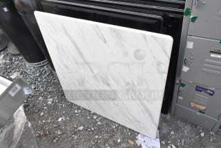 Set of five tabletops, various sizes, white marble design, excellent condition, suitable for diverse decor styles.