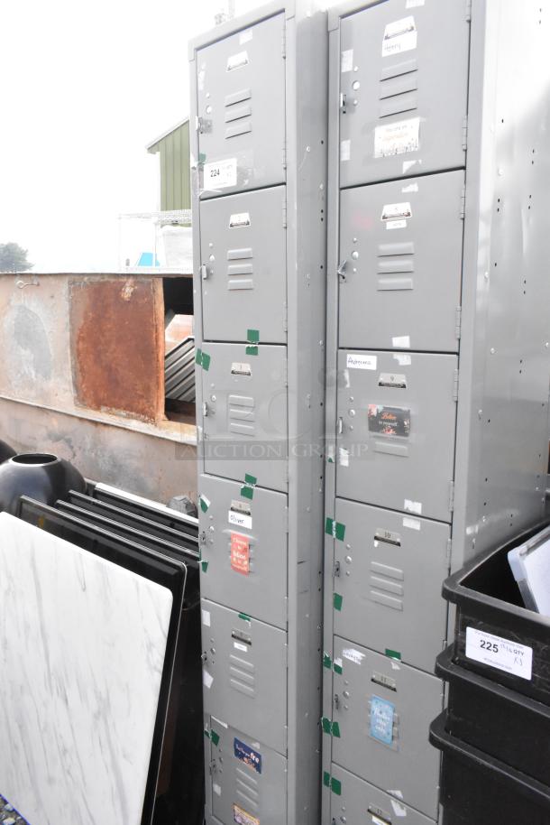 Two gray metal 6-cubby lockers, used condition with visible labels and small dents. Auction lot number 224.