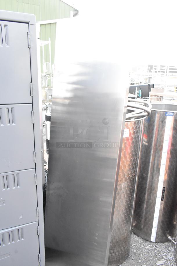 Stainless steel countertop, polished finish, rectangular shape, excellent condition, no visible dents or scratches.