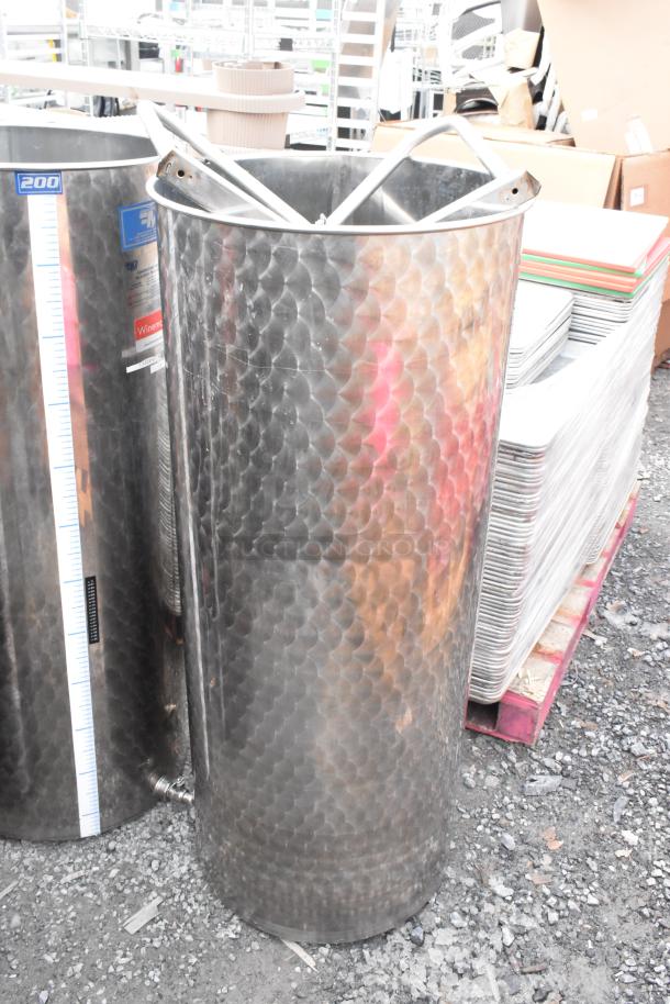 Marchisio metal tank, no lid, cylindrical shape, textured finish, visible measurement markings, suitable for storage.