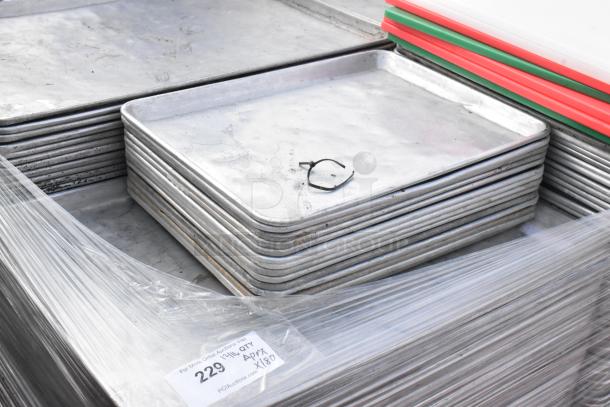 180 items including full-size and half-size metal baking pans and cutting boards. Tag: 229, 180x bid.