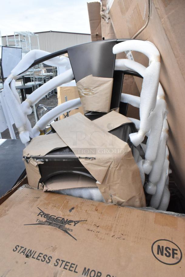 12 new scratch and dent items including a Regency stainless steel mop sink, boxed with Honeywell eyewash station and chairs.