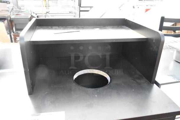 Black trash can shell with deposit hole, tray return, and door. Includes poly trash can. Good condition.