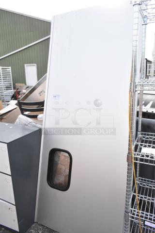 Two metal swinging kitchen doors, white finish, inspection window, bidding label shows lot number 236.