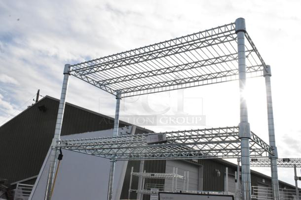 Chrome finish 6-tier wire shelving unit, sturdy construction, outdoor setting. Buyer must dismantle. Consider freight costs.