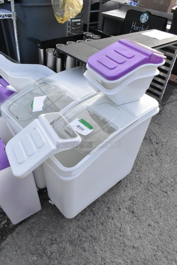 Brand new scratch and dent poly bins, including clear and white ingredient bins with purple lids, various sizes.