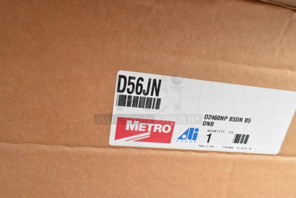 Cardboard box with Metro label; D56JN, model D2460NP B5DN B5 DNB, quantity 1, made in USA.
