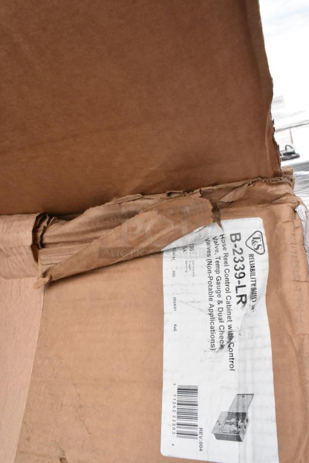 T&S B-2339-LR Hose Reel Control Cabinet in original, slightly damaged packaging with label details visible.