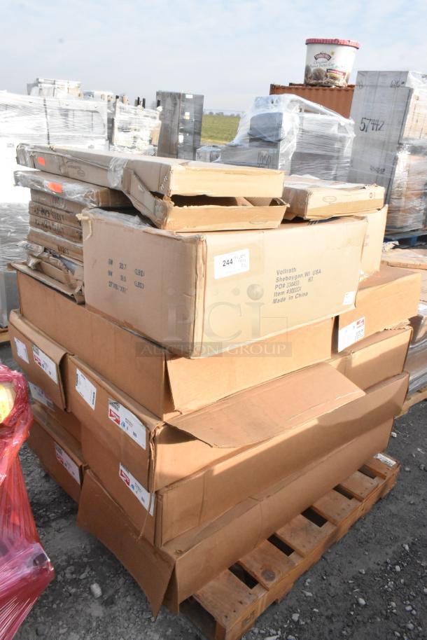 20 new scratch and dent items with labels including MetroMax Q shelf and Vollrath NSF pan cover, stacked on a pallet.