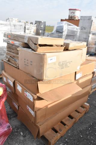 20 new scratch and dent items with labels including MetroMax Q shelf and Vollrath NSF pan cover, stacked on a pallet.