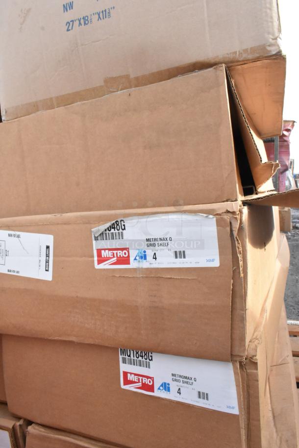 Stacked boxes of new items including Metro MQ1848G MetroMax Q 18" x 48" shelves. Each box shows a label with product details.