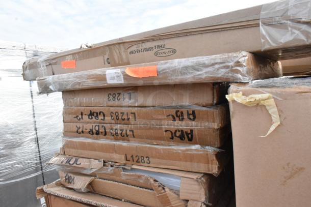 Stack of boxes labeled with Metro MQ1848G, SSWS1248-CWP, and Vollrath 9002CV items, indicating new scratch and dent condition.