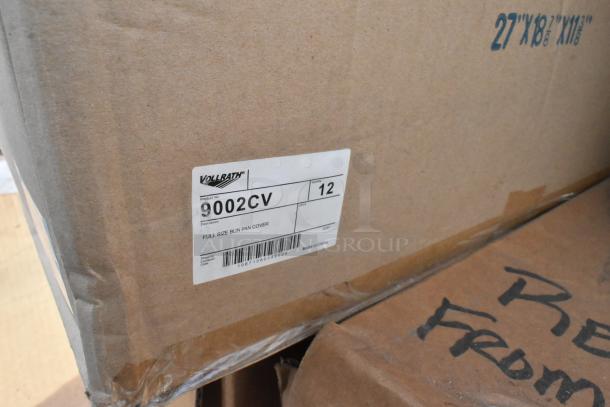 Box of Vollrath 9002CV NSF full-size bun pan covers, labeled with product details, quantity 12, new condition.