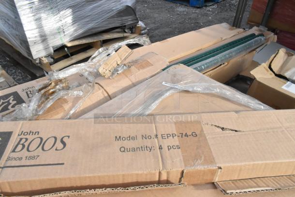 Boxes of 12 brand new "scratch and dent" items, including Focus FF2436G shelf and John Boos EPP-74-G post.