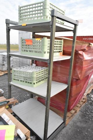 4-tier shelving unit with green crates, sturdy metal frame, and white shelves. Includes orange labels. Used condition.