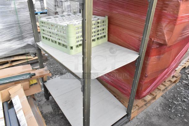 4-tier shelving unit with metal frame, containing green plastic crates. Used condition, suitable for storage needs.