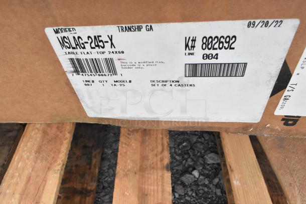 Label on a package indicating a 60" Advance Tabco MSLAG-245-X work table with undershelf, 304 stainless top, model TA-25, includes set of 4 casters.