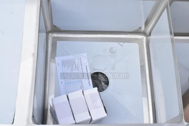 Brand new Steelton 522S31818LRC corner sink; 57" stainless steel, 3 compartments, 18-gauge, 2 drainboards, no legs.